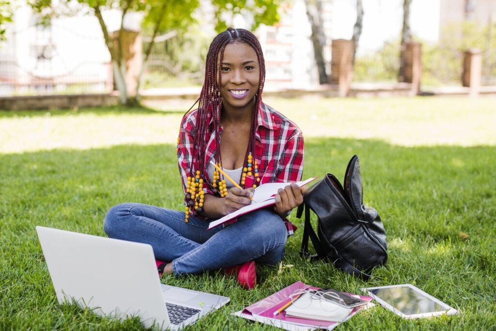 pretty-girl-with-studies-posing-park